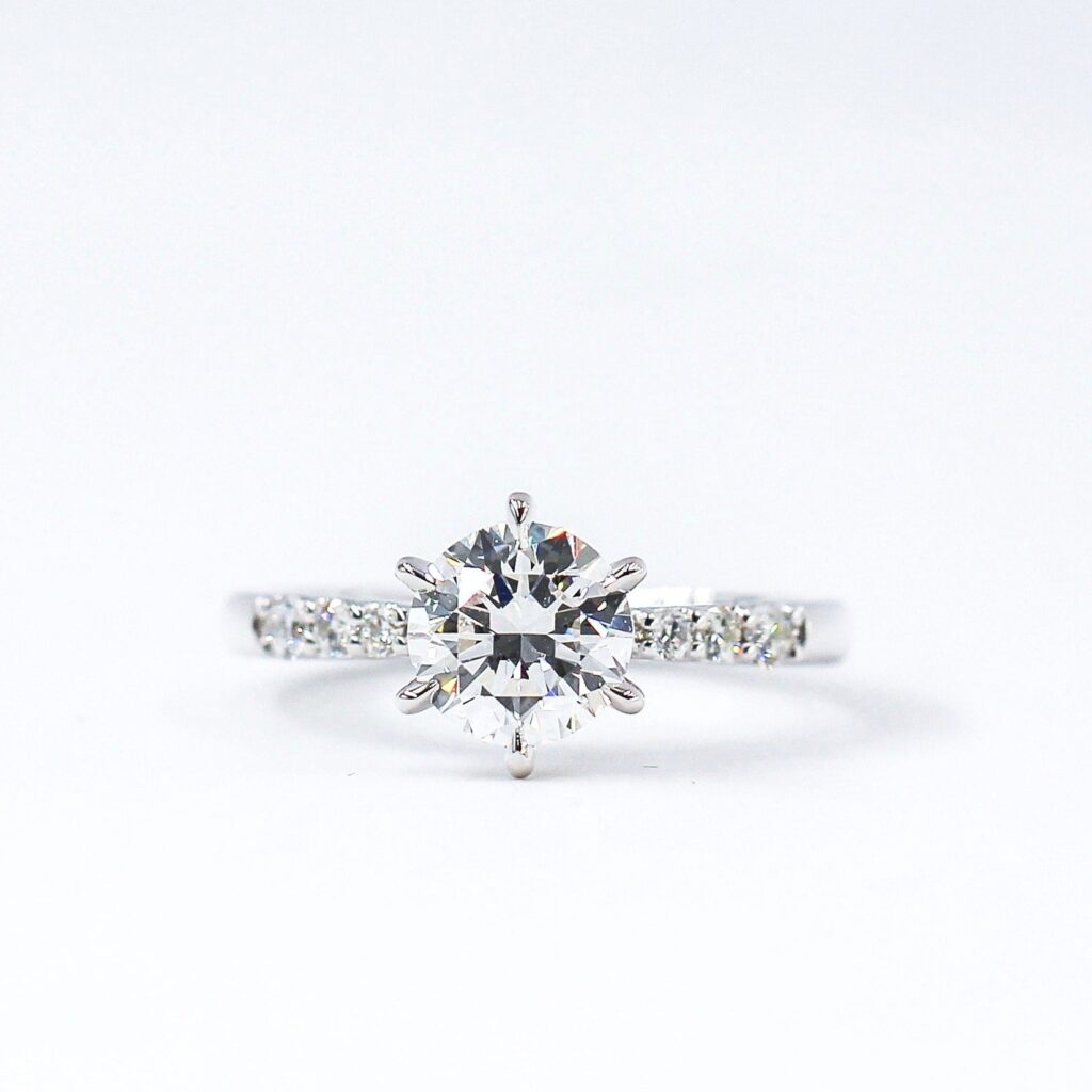 Round shoulder diamond engagement rings