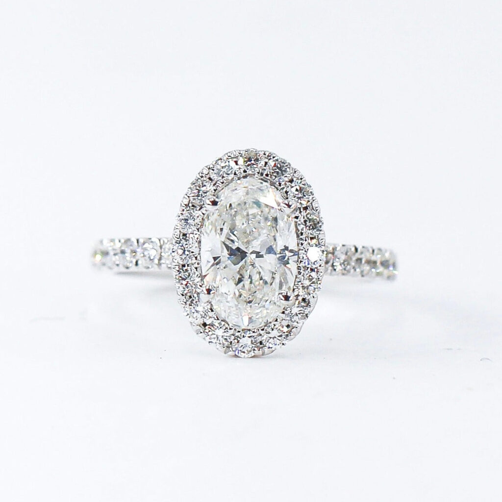 Oval Cut Halo Diamond Engagement Rings